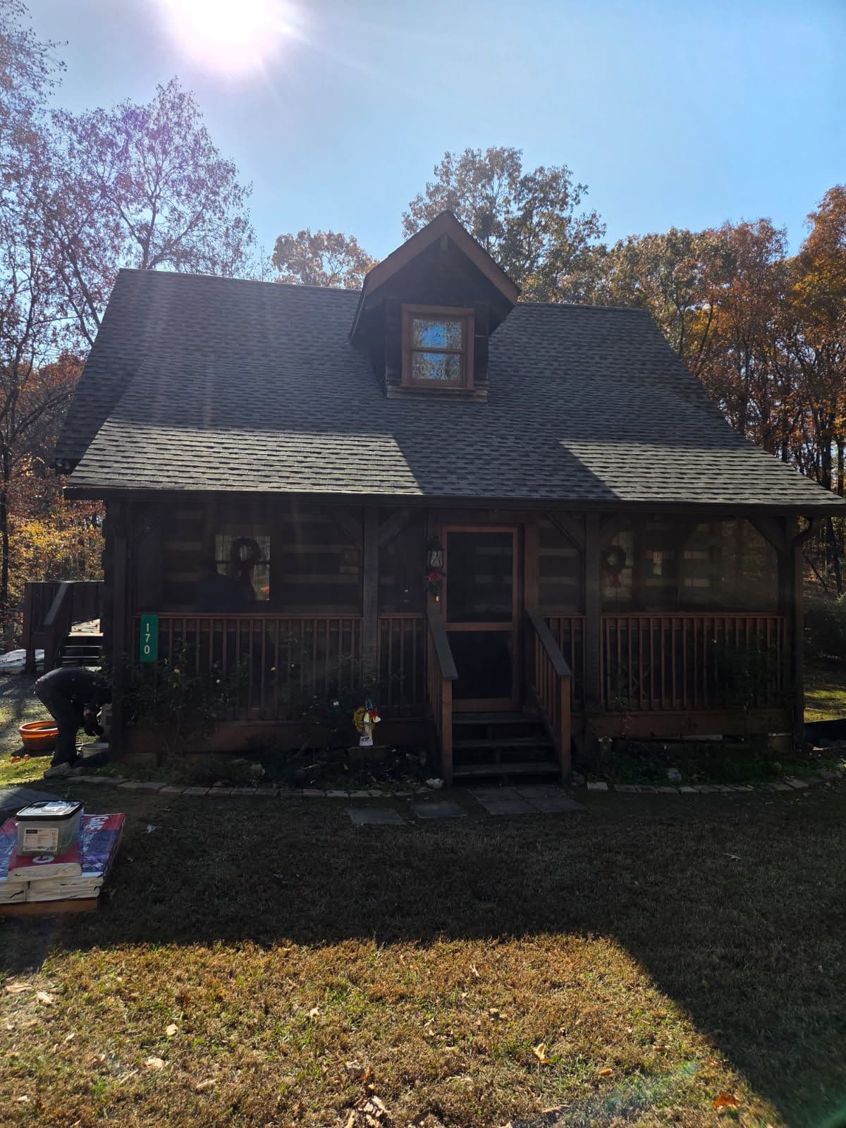 Gallery photos for Cozy Cabin Upgrade with Roof and Deck Makeover: Image #1
